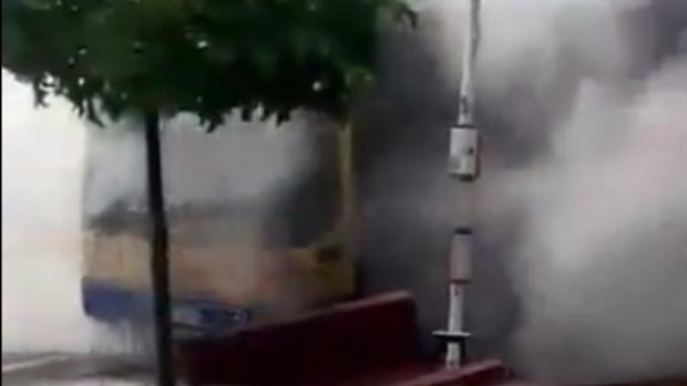Footage of the smoke billowing from the bus at Moorooka.