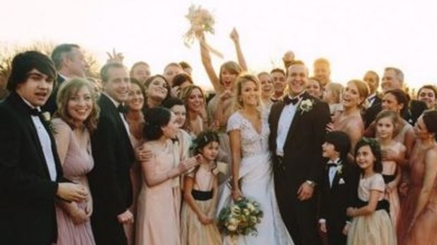 Taylor Swift celebrating her best friend's marriage.