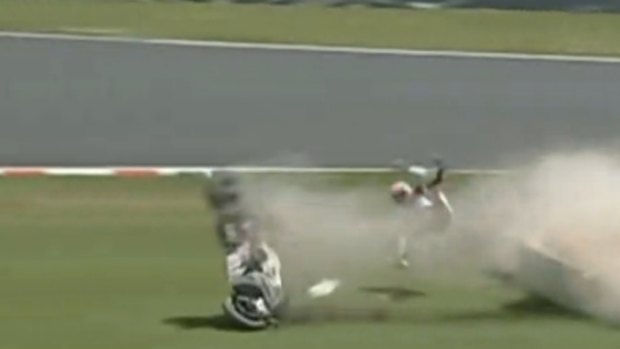 Crash: Casey Stoner is thrown form his bike.