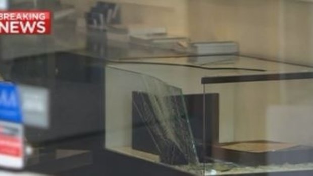 One of the smashed cabinets in the Holloway Diamonds store.