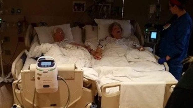 In their final hours, Dolores and Trent Winstead lie together in their hospital beds.
