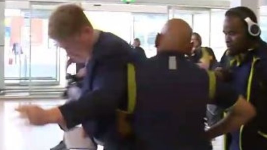 Confrontation: Zunaid Wadee shoulder charges reporter Will Crouch.