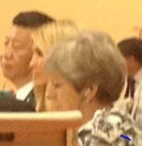 Taking her father's seat: Ivanka Trump, seated between China's presdient Xi Jinping and Britain's Theresa May at the G20.