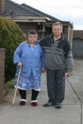 Anna's parents standing outside their family home in Lalor.