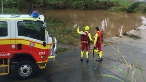 Rescuers searching for a man who could have driven a stolen car in to floodwaters at Scrubby Creek.