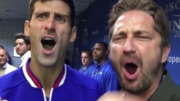 Battle cry: Novak Djokovic and Gerard Butler ham it up.