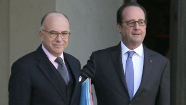 Newly appointed French Prime Minister Bernard Cazeneuve (left) with President Francois Hollande.