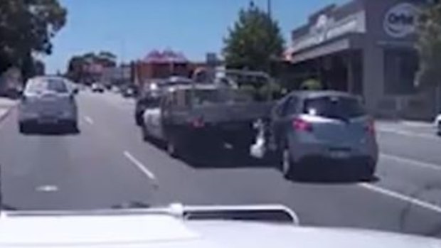 The car scrapes the side of the ute in a last minute swerve.