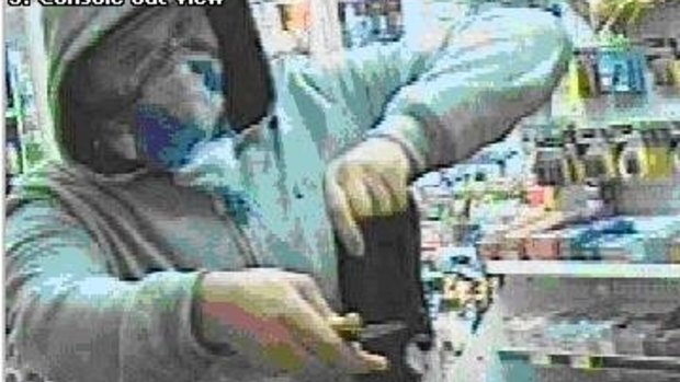 A robbery by a man armed with a knife at a petrol station in Newcastle, NSW, in March 2012. The robber took $500 and "a quantity of cigarettes".