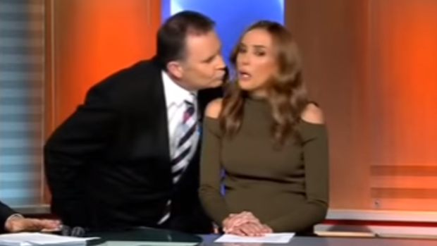 Pregnant Rebecca Judd recoiled as Nine News colleague Tony Jones kissed her goodbye.