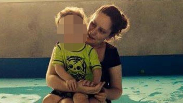 Sarah Paino with her two-year-old son. He suffered minor injuries in the crash.