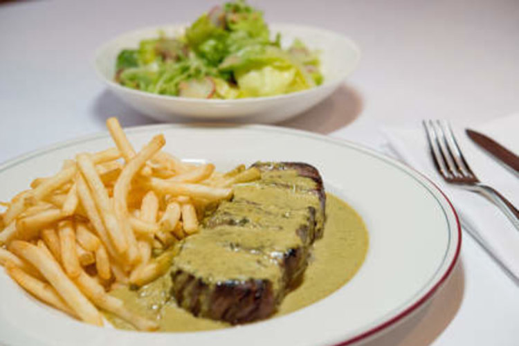 Signature dish: Steak, green salad with dijon vinaigrette and bottomless fries. Entrecote South Yarra