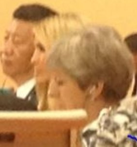 Taking her father's seat: Ivanka Trump, seated between China's presdient Xi Jinping and Britain's Theresa May.