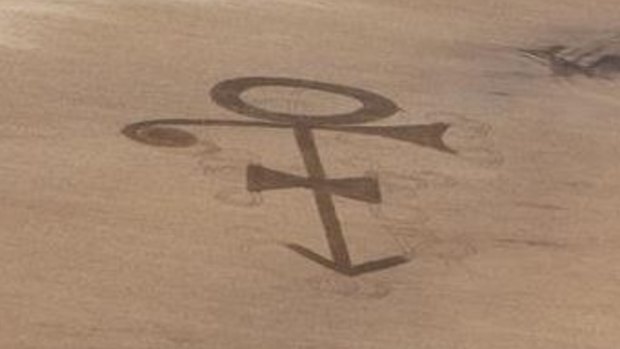 Prince symbol cut into a field in North Dakota.