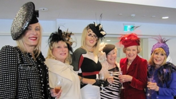 Maureen Boyce (left) with friends at a Brisbane race meeting.