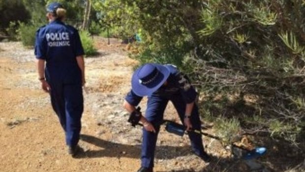 Forensic police search for clues after Michael Watson was found dead in Lesmurdie last year.