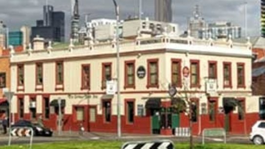 The pub, previously known as the Carlton Inn, before it was razed. 