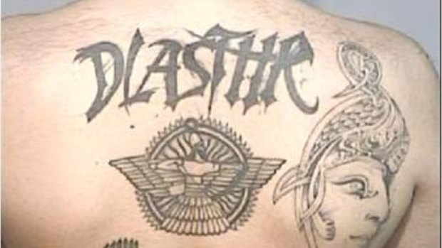 A DLASTHR gang member tattoo. 