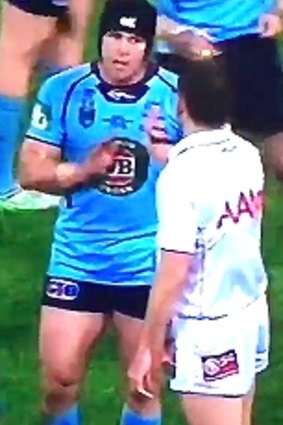 Blues hooker Michael Ennis argues with referee Gerard Sutton.