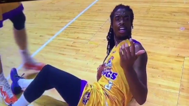 Baffled: Marcus Thornton looks up after a fan tipped beer on him during the game.