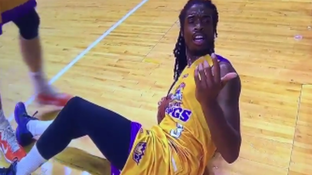 Baffled: Marcus Thornton looks up after a fan tipped beer on him during the game.