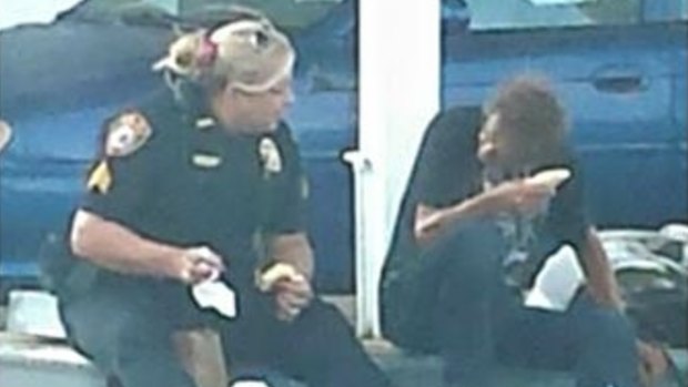 Police officer shouts homeless man breakfast, warms up social media