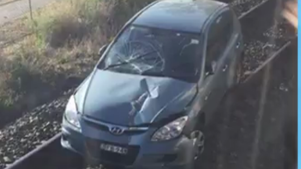 The car that crashed onto railway tracks at Toongabbie.  