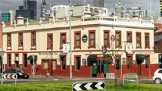 The pub, previously known as the Carlton Inn, before it was razed. 