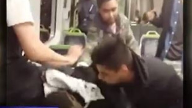 A video has emerged of a group of youths beating a man on the Sunbury line train.  