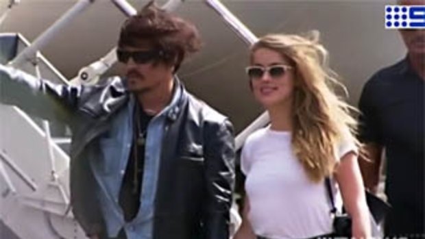 Johnny Depp and Amber Heard arrive at Brisbane Airport last year.