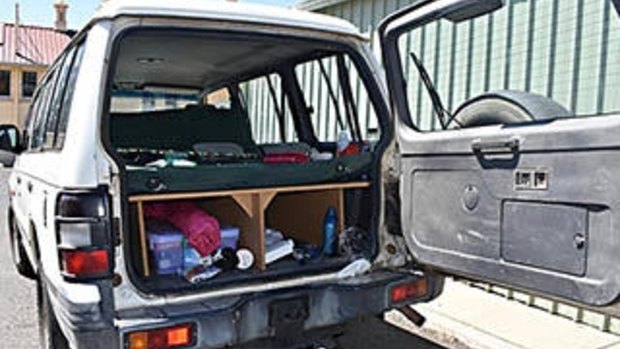 The woman's alleged captor was found hiding in the back of their white Mitsubishi Pajero, police said.