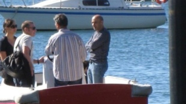 Moses Obeid, far right,  at Elizabeth Bay Marina.