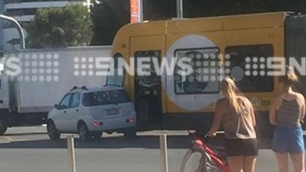 A tram and a car have collided on the Gold Coast.