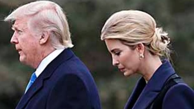 President Donald Trump and his daughter Ivanka walk to board the Marine One helicopter at the White House.