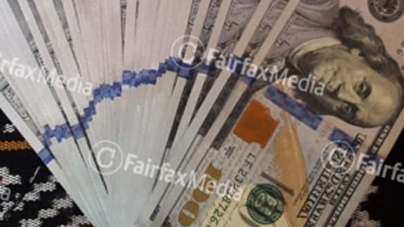 A wad of cash allegedly paid to people smugglers by the Australian government.