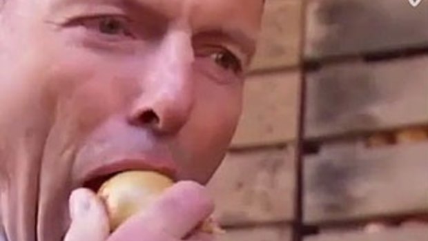 Tony Abbott indulges in some fresh produce earlier this year. 