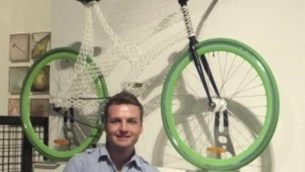 Queensland researcher James Novak and his award-winning 3D-printed bicycle