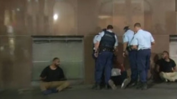 Police respond to a brawl in Sydney on Sunday morning.