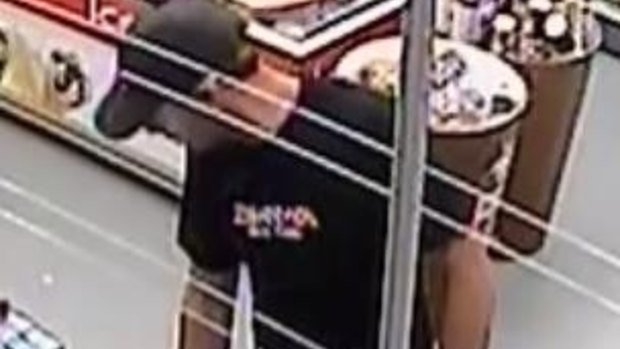 ACT police released this footage of the man at the time of the robbery.
