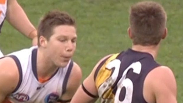 The moment where Toby Greene appears to spit at his opponent.