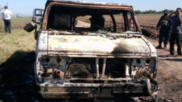 The burnt-out van found in the search for the missing Australians. 