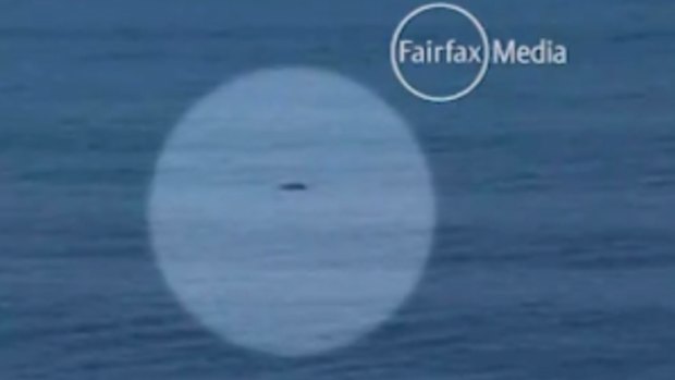 Mysterious: a dark shadow in the water during the quarter-finals of the J-Bay Open.