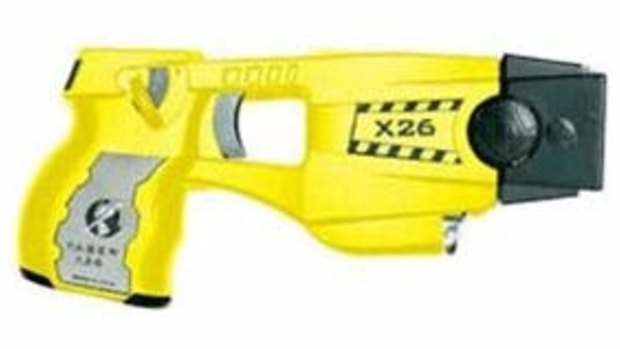 Police found Tasers among a haul of illegal items at addresses in north Queensland.
