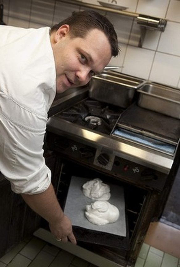 8. Place the tray in the middle of the oven and immediately turn the temperature down to 120 degrees Celsius