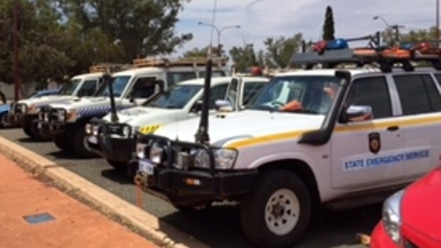 Search vehicles assemble on Friday morning outside Laverton Police Station. 