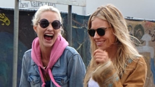Poppy Delevingne (L) and Sienna Miller at day 2 of the Glastonbury in England.