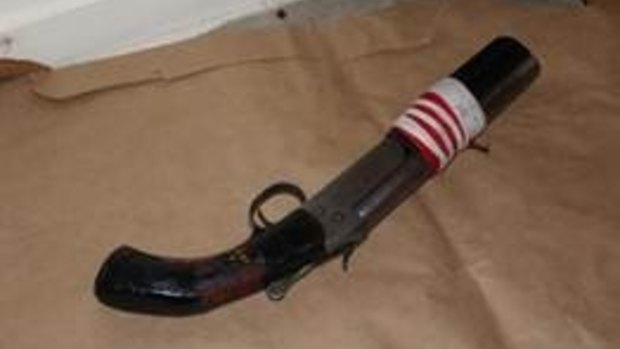 The sawn-off shotgun seized by detectives on Friday afternoon.