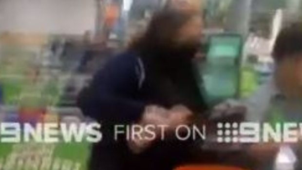 A woman has been charged after allegedly attempting to hold up a Neutral Bay supermarket.