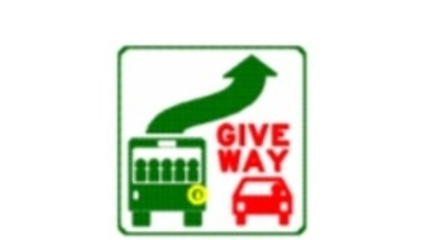 A give way to buses sign.