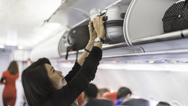 Qantas cabin baggage size hot sale